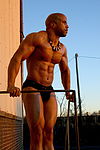 Sunrise in black briefs 