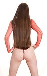 From behind