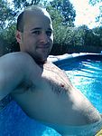 Lounging in the pool on a hot day.