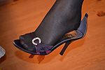 Mmmm heels, red nails, seamed stokings...what a dream for foot-fetish lover:)